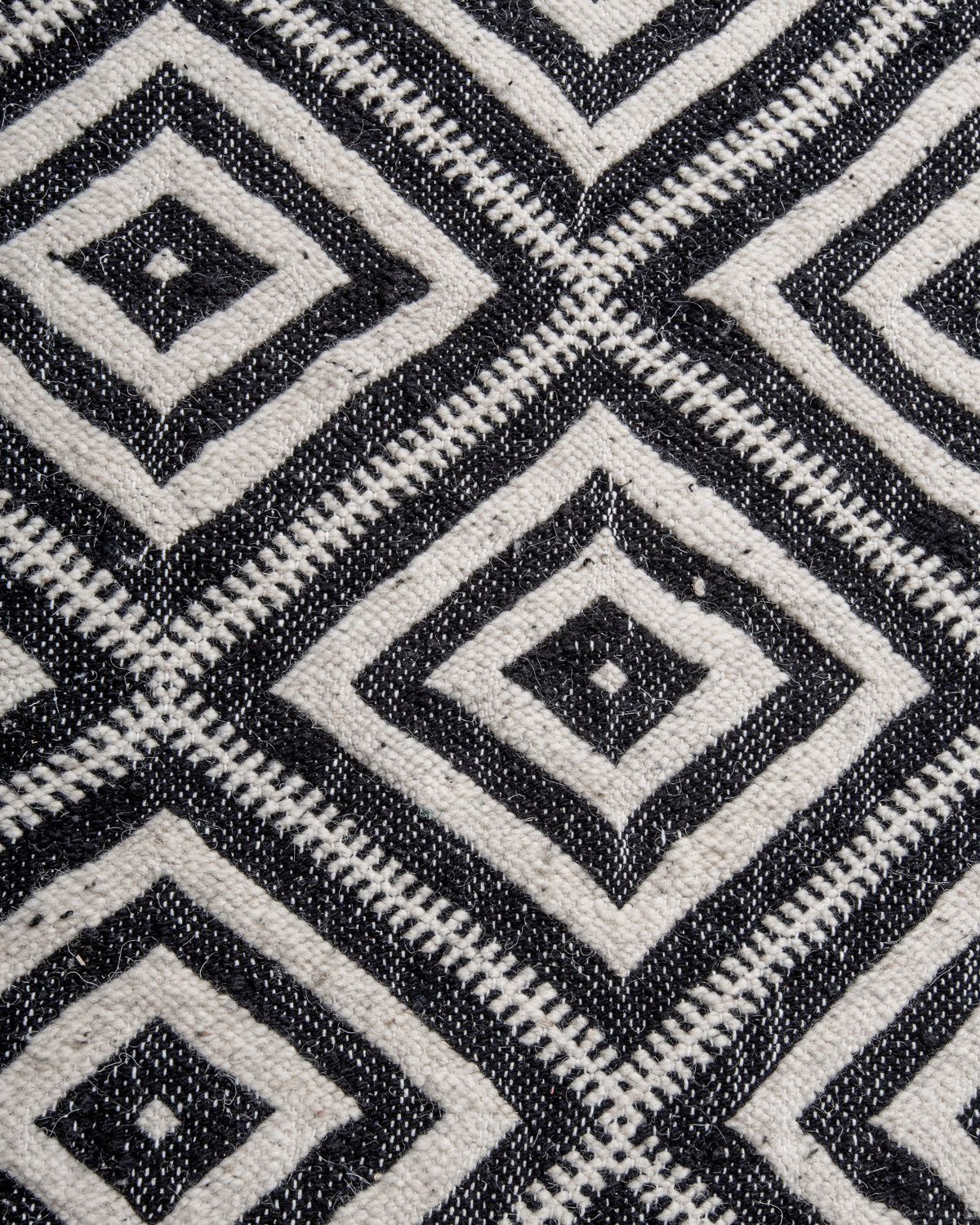 Modern, handcrafted Berber runner rug from Morocco. Flat-woven Kelim carpet in black and white design. Made of 100% wool.